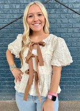 Load image into Gallery viewer, BUBBLE BABYDOLL BLOUSE WITH TEXTURED FABRIC AND CONTRAST BOW