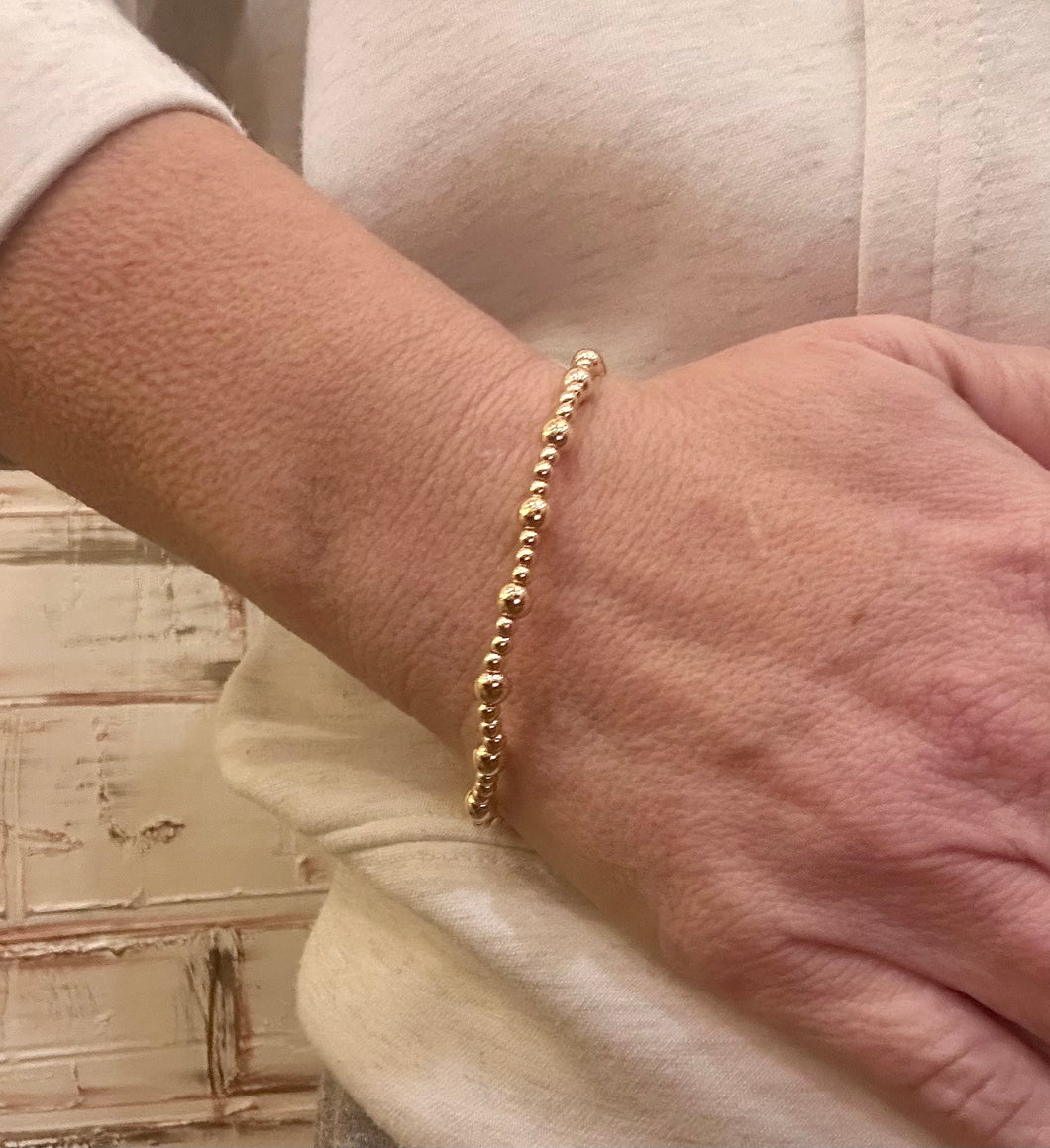 M single gold beaded bracelet