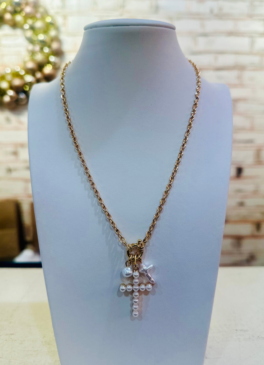 Gold chain with pearl cross charms